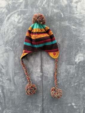 Billabong Women's Multi-Colored Striped Knit Earflap Beanie with Braided Tassels